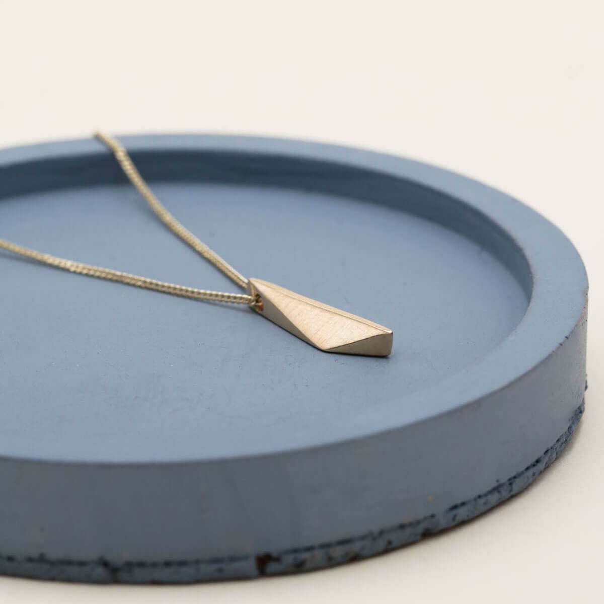Small gold pendant in solid 9ct yellow gold on a delicate curb chain, an elegant everyday necklace