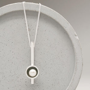 Handmade black pearl bar necklace in oxidised sterling silver with a genuine freshwater pearl on a fine silver chain.