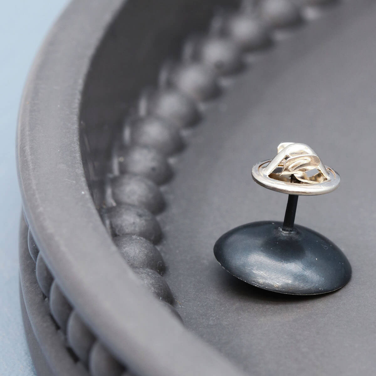 Detailed view of oxidised sterling silver pearl tie pin highlighting the natural lustre of the freshwater pearl.