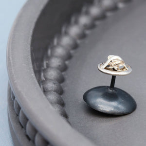 Detailed view of oxidised sterling silver pearl tie pin highlighting the natural lustre of the freshwater pearl.