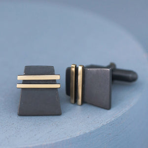 Polished Black and Gold cufflinks displayed on deep blue background, showing contrast detail, perfect luxury special cufflinks for groomsmen gifts.