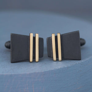 Black and Gold cufflinks on a deep blue background showing modern pinstripe design, perfect special cufflinks gift for him for weddings or anniversaries.
