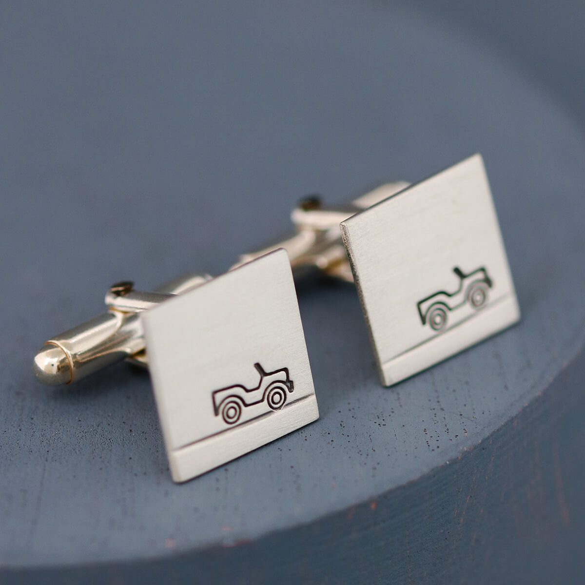 Pair of Car cufflinks shown face on to highlight car motif and matte finish, ideal gift for car lovers or Groom’s wedding cufflinks.