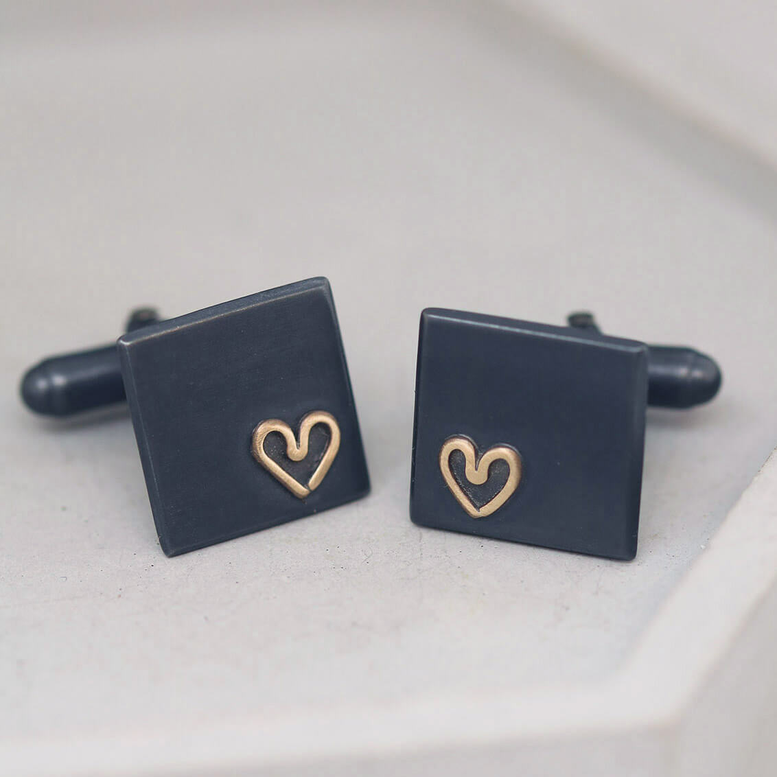 Luxury silver cufflinks with 9ct gold heart accent, elegant special anniversary gifts for husband or groom.