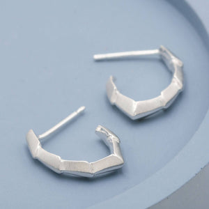 Silver hoop earrings with a sculptural geometric design, handmade jewellery gift for her and easy everyday earrings