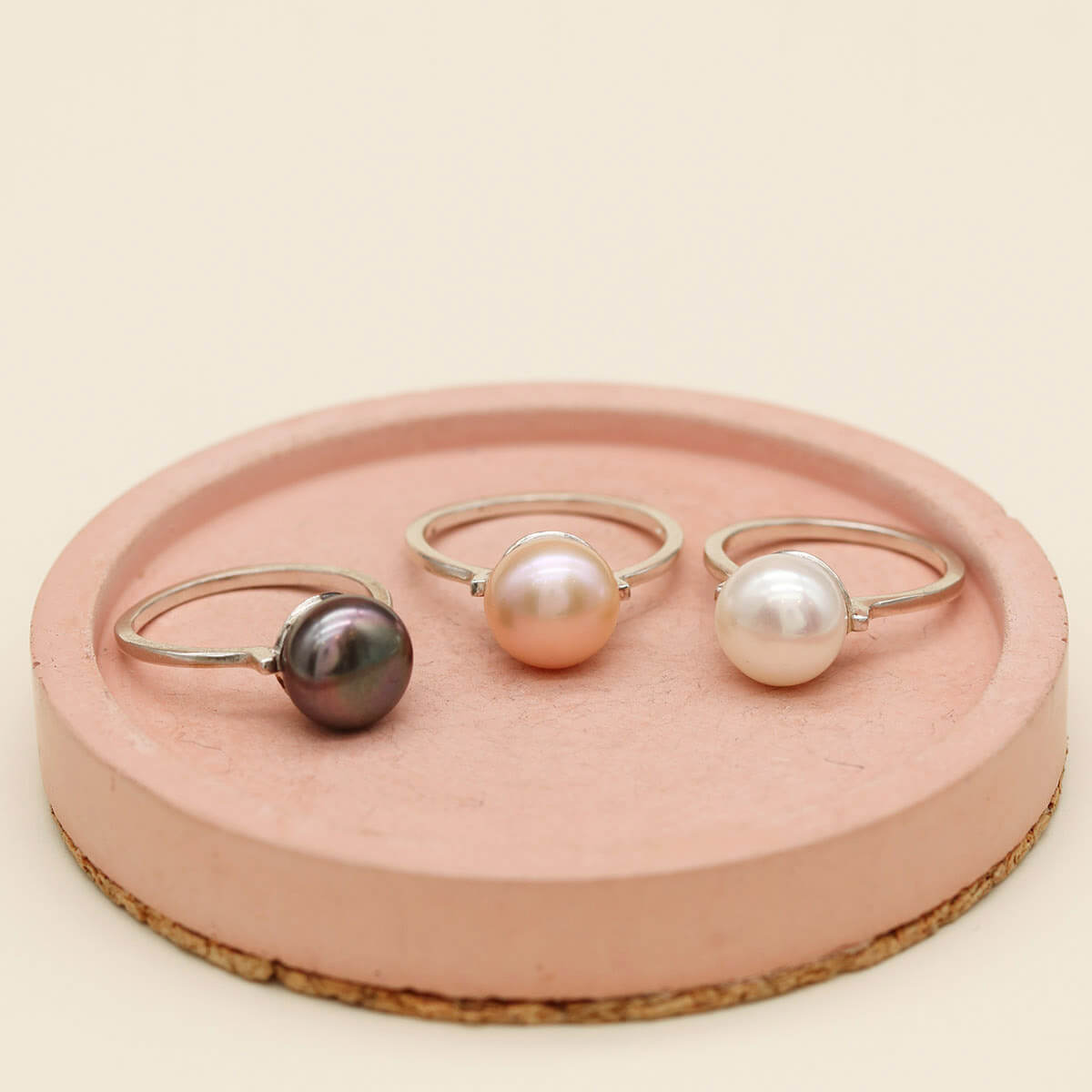 Handmade pearl cocktail rings with white, peach and peacock freshwater pearls