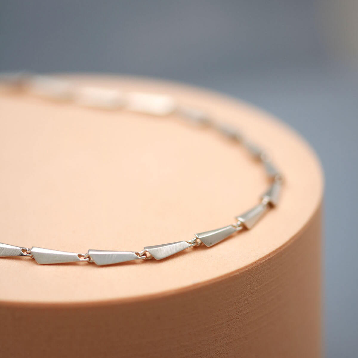 Art Deco necklace in solid sterling silver showing the detailed shape and movement of each individual link