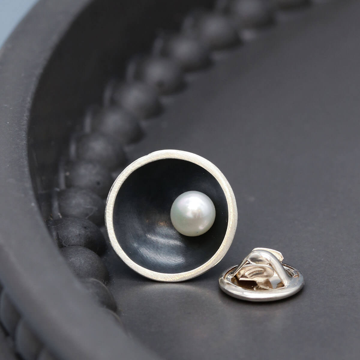 Oxidised sterling silver pearl pin with genuine freshwater pearl, designed to be worn as a tie pin, lapel pin or cravat pin.
