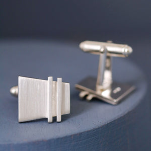 Angled view of sterling silver Modern cufflinks with clean Art Deco-inspired lines, ideal nice anniversary gift for husband.