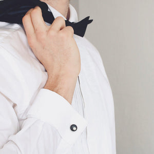 Handmade sterling silver pearl cufflinks shown worn with a white shirt, highlighting their elegant Art Deco design.