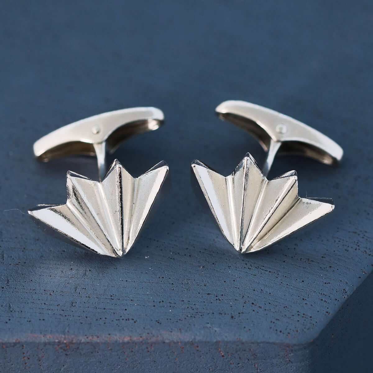 Pair of art deco cufflinks on deep blue background, handmade men’s silver cufflinks with geometric fan design, ideal groom or anniversary gift
