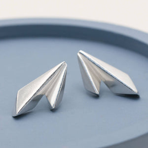 Geometric sterling silver stud earrings with clean Art Deco-inspired lines and a sculptural shape