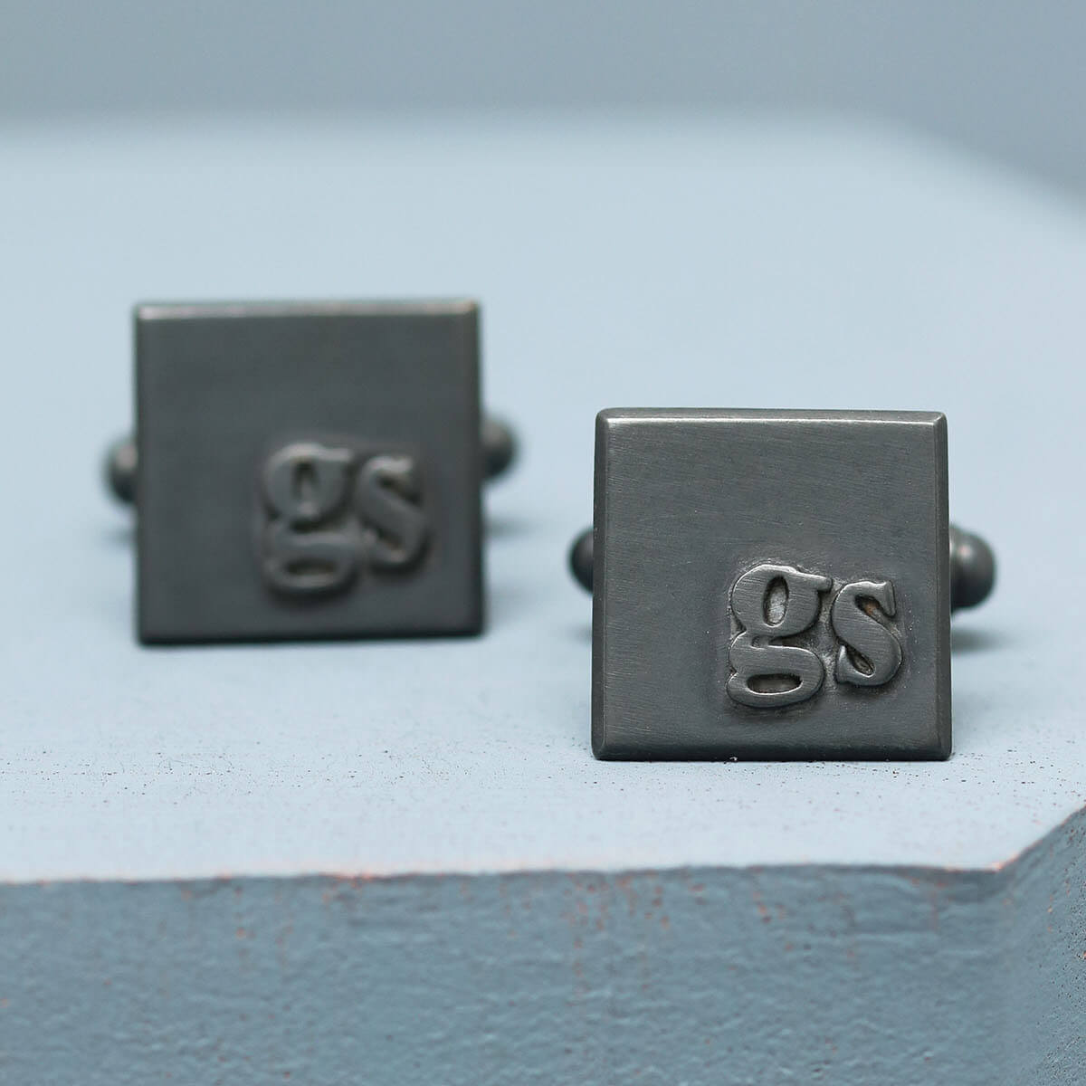 GS initial cufflinks, personalised cufflinks for him and thoughtful gift for a son on a deep blue background