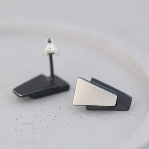 Sterling silver black earrings with geometric design on a grey dish, perfect gift for her for Christmas or special celebrations.