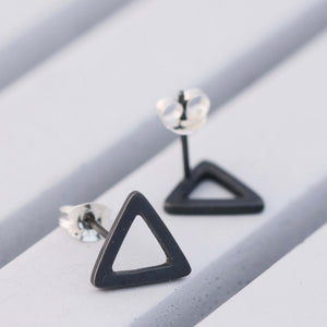 Oxidised black Silver Triangle Earrings on grey dish, bold triangular earrings