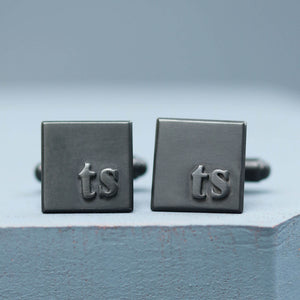 Initial cufflinks with TS initials in sterling silver, personalised cufflinks for a wedding gift, on a deep blue background