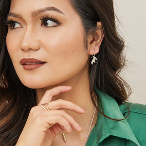 Fan drop earrings on model shown from the side, displaying gentle movement; perfect gift for lovers of art deco style.