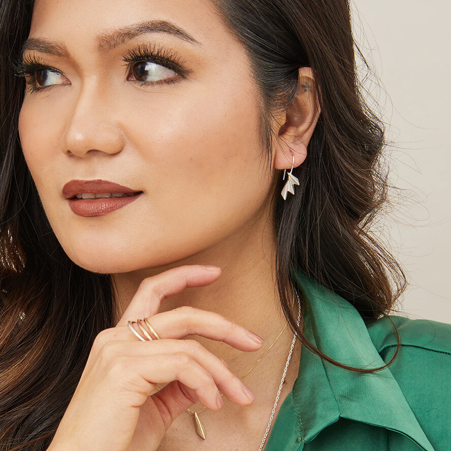 Fan drop earrings on model shown from the side, displaying gentle movement; perfect gift for lovers of art deco style.