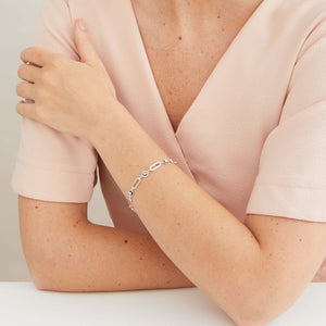 Black pearl chain bracelet worn on the wrist, showcasing the bold sterling silver links and oxidised freshwater pearl settings.
