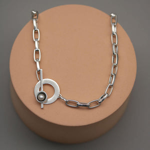 Chunky pearl necklace with bold sterling silver chain and freshwater pearl, handcrafted in the UK using traditional silversmithing techniques.