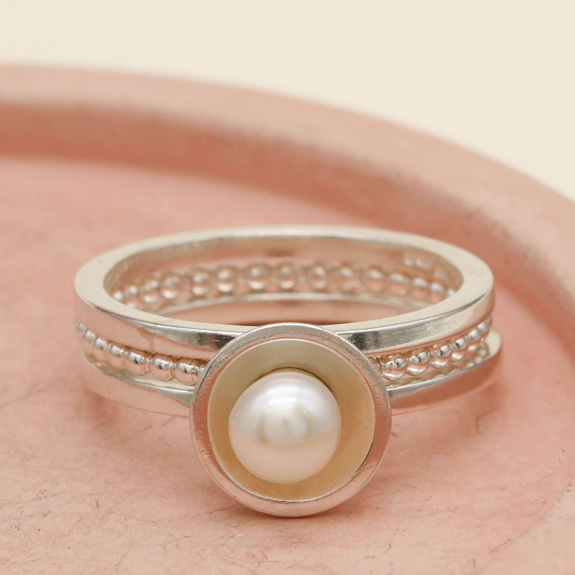 Freshwater pearl ring set featuring three handmade sterling silver stacking rings