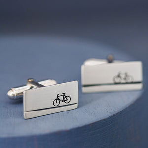 Sterling silver cycling cufflinks with hallmark shown on deep blue background, perfect cycling-themed gift for Dad or groom cufflinks for wedding day.
