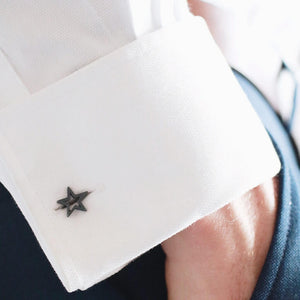 Matte black Star cufflinks styled on a cuff – understated and modern Star cufflinks, perfect for a graduation gift for son or new job milestone.