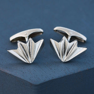 Polished sterling silver art deco cufflinks on deep blue background, ideal men’s cufflinks for groom, anniversary or graduation gift