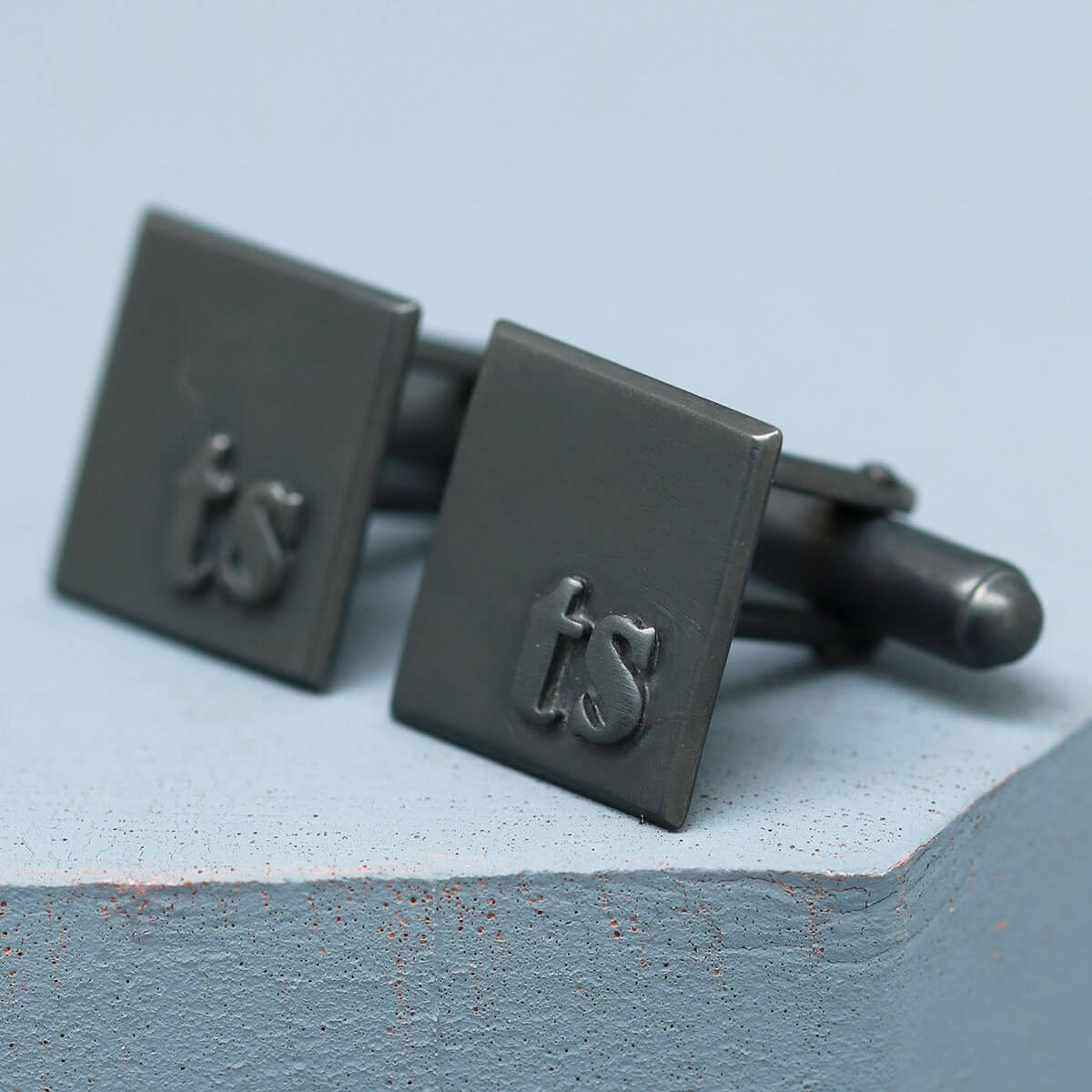 TS initial cufflinks, personalised wedding cufflinks and meaningful gift for the groom, on a deep blue background