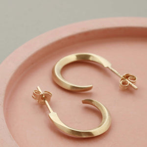 Real gold small hoop earrings on pink dish, 9ct hoop earrings everyday jewellery