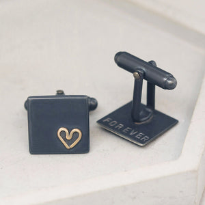 One cufflink turned to show hand-stamped personalisation on reverse, romantic Groom wedding cufflinks in silver and gold.