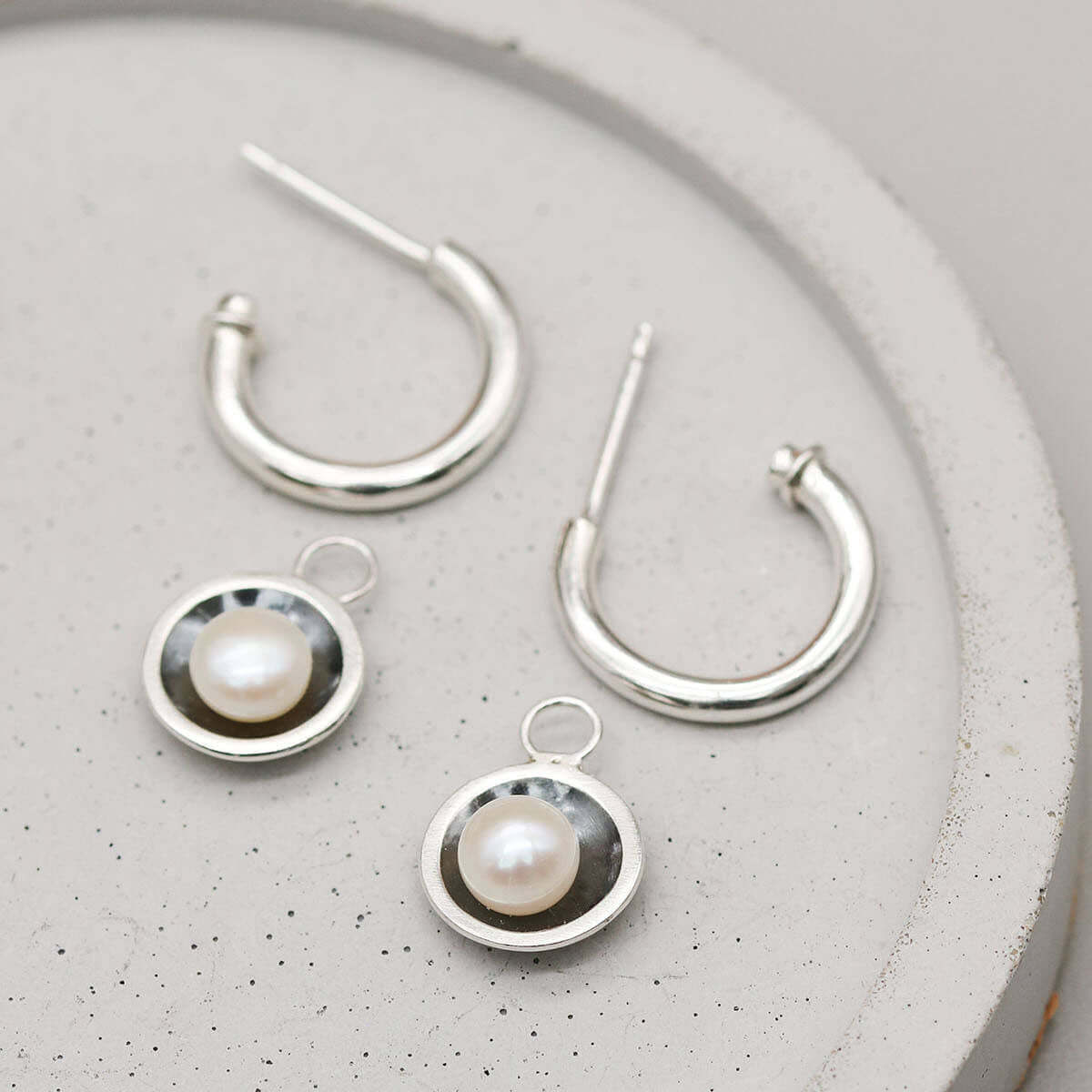 Hoop earrings with pearl drop handcrafted from oxidised sterling silver and genuine freshwater pearls.