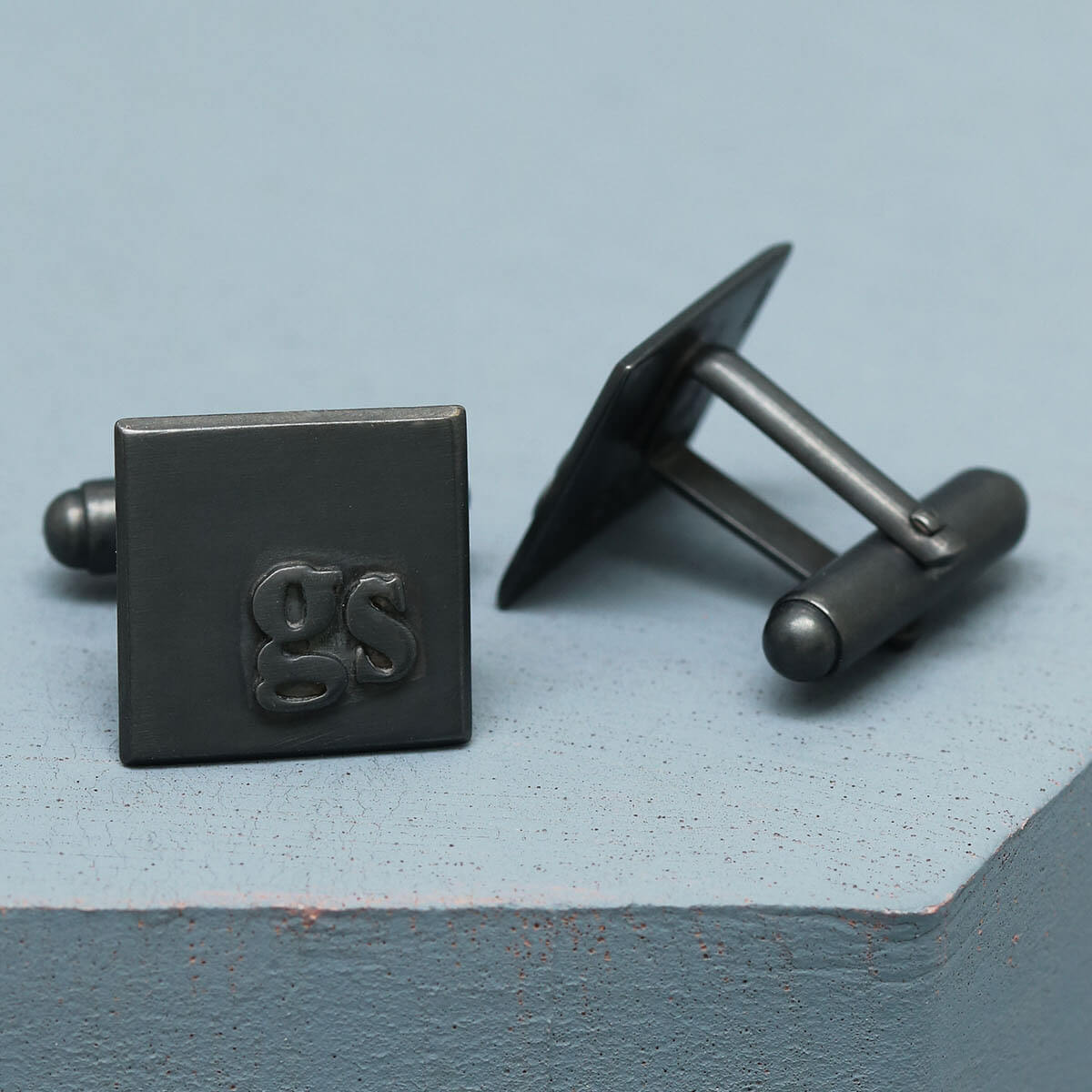 GS initial cufflinks in sterling silver, personalised 18th birthday gift for son or graduation gift on a deep blue background