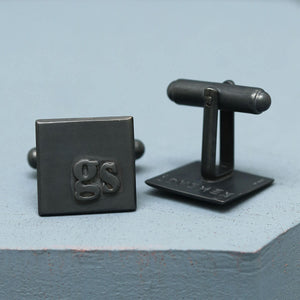 Initial cufflinks with GS initials in sterling silver, personalised cufflinks for a wedding gift, on a deep blue background