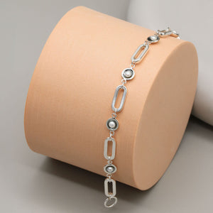 Black pearl chain bracelet featuring genuine freshwater pearls and solid sterling silver links, handcrafted in small batches.