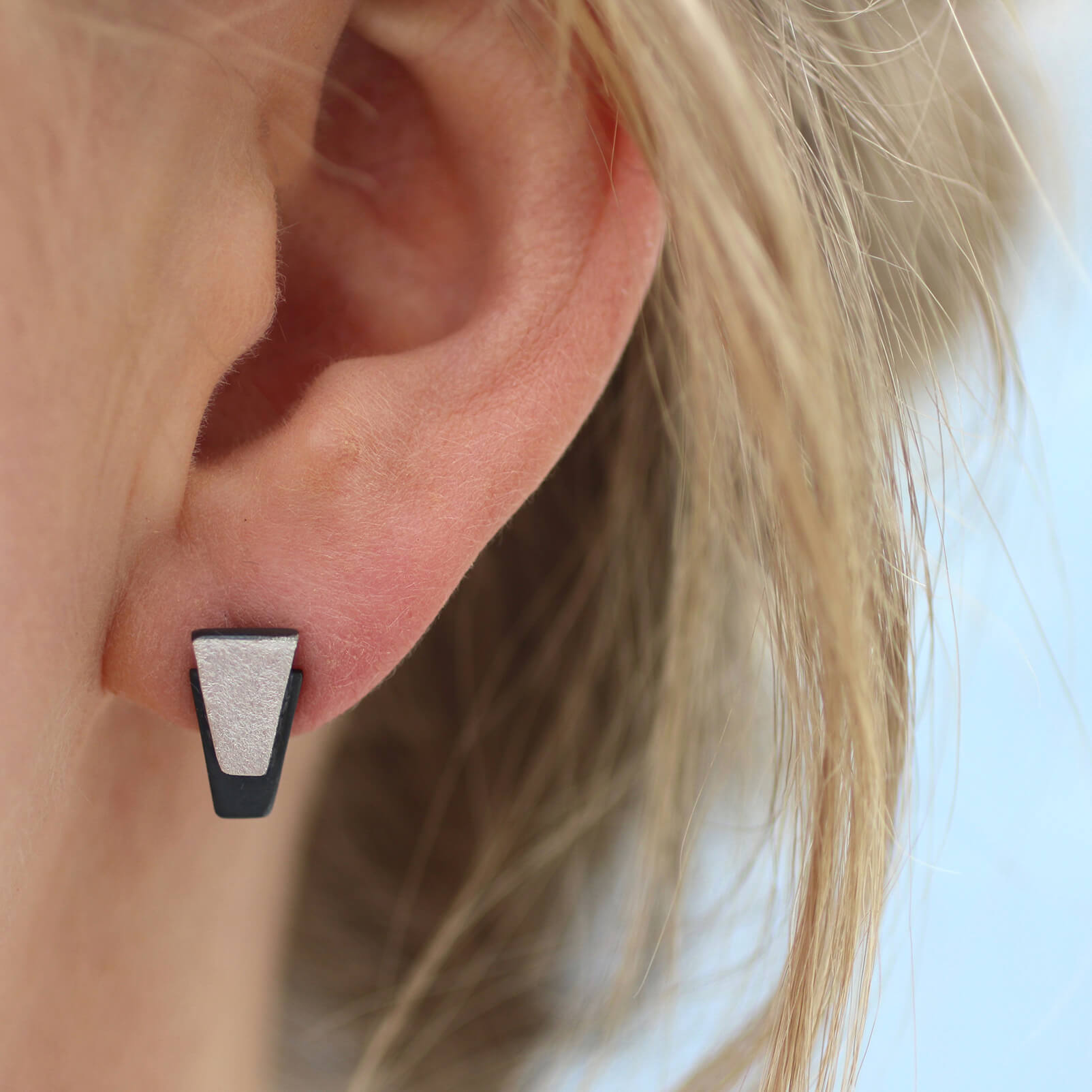 Modelled sterling silver black earrings showing geometric design, perfect gift for her for birthdays, anniversaries or bridal jewellery.