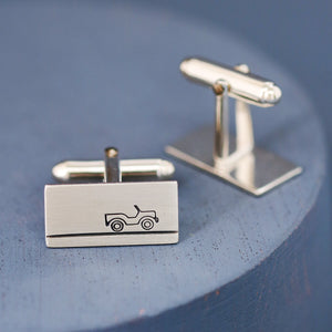 Close-up of handmade sterling silver land rover cufflinks showing detailed jeep design, ideal gift for a car lover or groom on his wedding day.