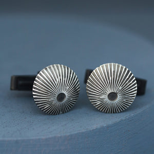 Side view showing the domed shape of silver and black cufflinks, premium mens luxury cufflinks for milestone birthday or Christmas gift.