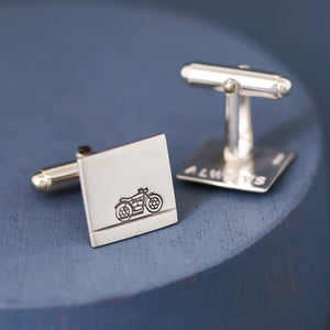 Motorbike cufflinks displayed on deep blue background, ideal Father’s Day gift for a dad who loves motorcycles