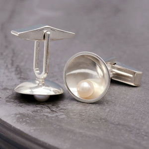 Handmade freshwater pearl cufflinks for men with classic sterling silver setting and timeless design.