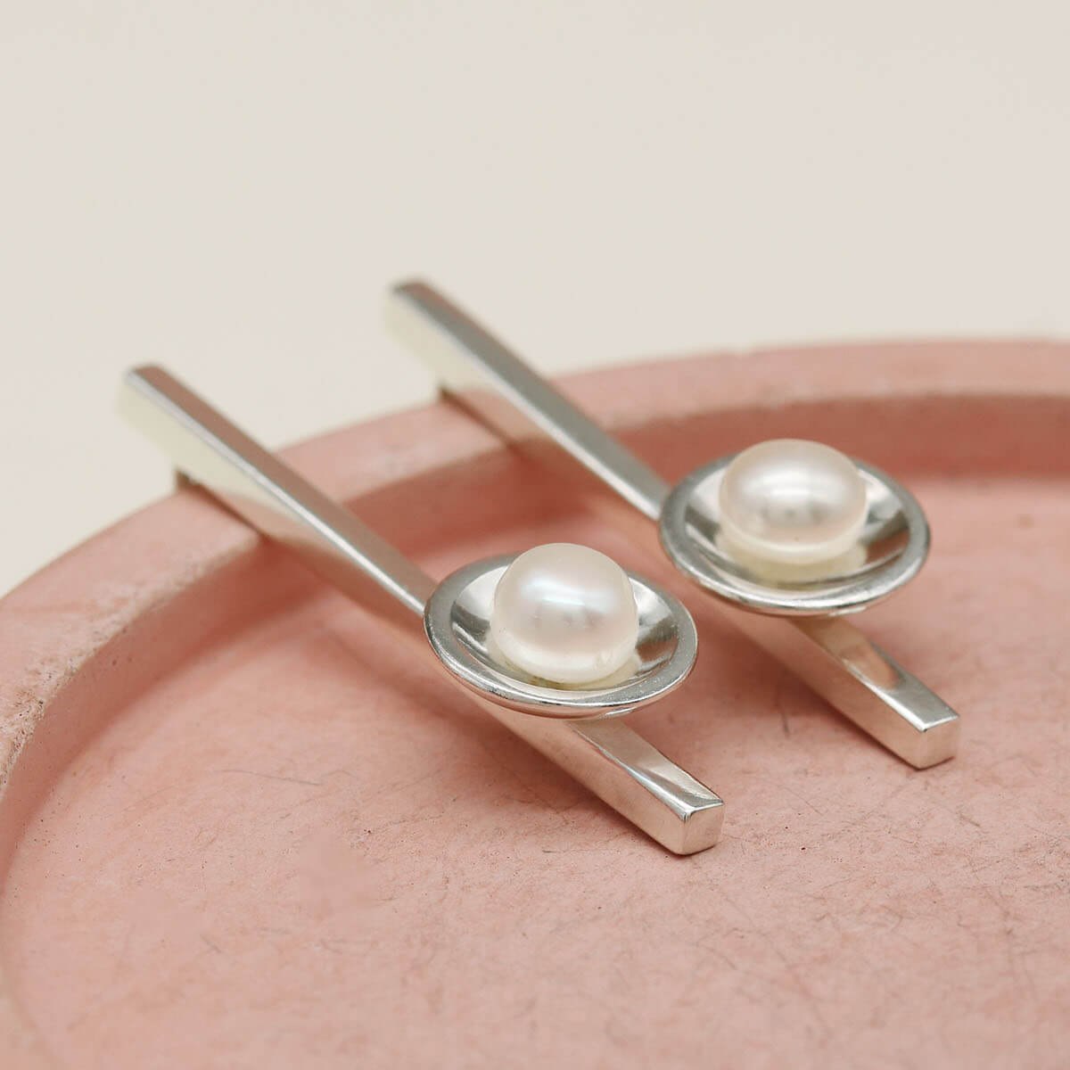 Elegant long pearl earrings handcrafted in sterling silver with genuine 5mm freshwater pearls.v