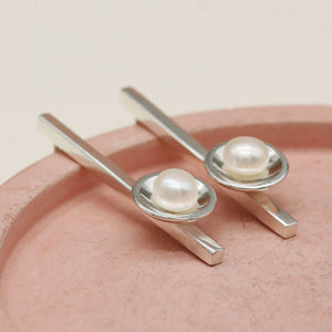 Elegant long pearl earrings handcrafted in sterling silver with genuine 5mm freshwater pearls.v