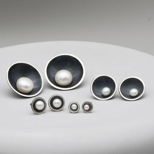 Comparison of Petite, Classic, Signature and Statement pearl stud earrings showing all four sizes side by side.