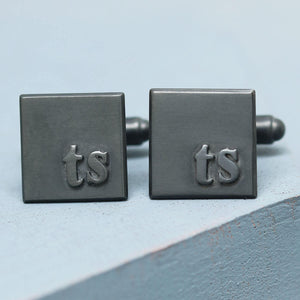 Personalised cufflinks for him with TS initials, handmade sterling silver cufflinks for a wedding, on a deep blue background