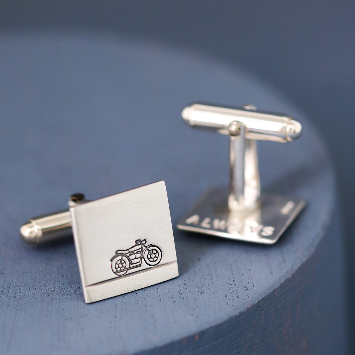 Motorbike cufflinks with matte brushed finish on deep blue background, perfect Christmas gift for a motorbike enthusiast husband