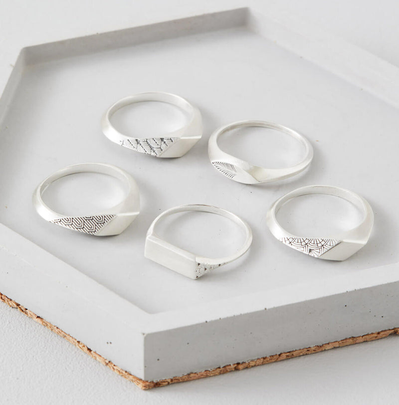 Collection of five Deco-inspired sterling silver signet rings, including modern signet ring and pinky signet ring styles, ideal for gifting or collecting.