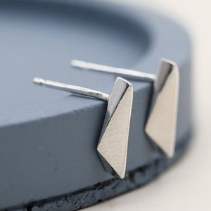 Small silver stud earrings in polished sterling silver, understated everyday jewellery and gift idea for women