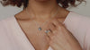 Model wearing a handcrafted black pearl pendant necklace in oxidised sterling silver with a genuine freshwater pearl on an 18-inch chain.