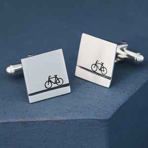 Single cufflink turned to show engraved message on reverse, stylish bike cufflinks and heartfelt cycling gifts for him for special occasions.