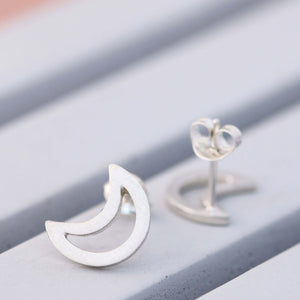 Silver moon earrings showing post and scroll backs, sterling silver studs